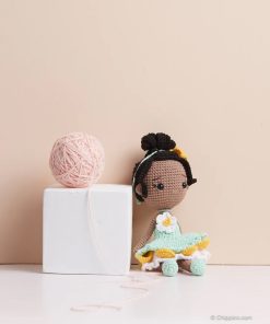 Búp bê len bé gái váy xanh hoa trắng tóc búi